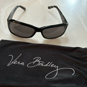 Vera Bradley black sunglasses with Pirouette pattern inside arms.